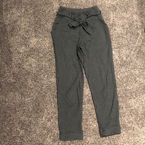 Green and white striped pants